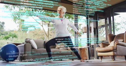 Mature woman practicing yoga with projected code overlay, balancing wellness and tech