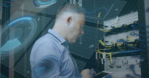 Caucasian IT Technician Analyzing Server Data through Digital Interface - Download Free Stock Images Pikwizard.com