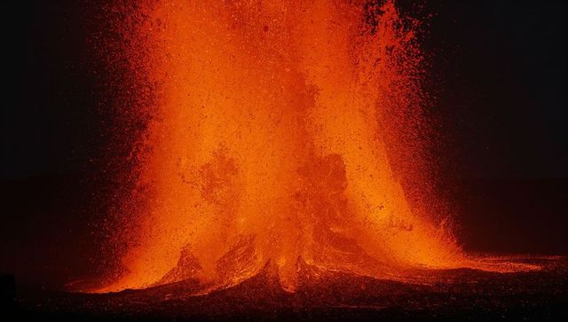 Volcano Lava Fountain Erupting at Night in Dramatic Display