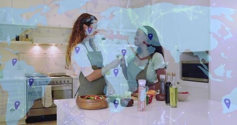 Toasting friends in modern kitchen with global map overlay, healthy cooking celebration