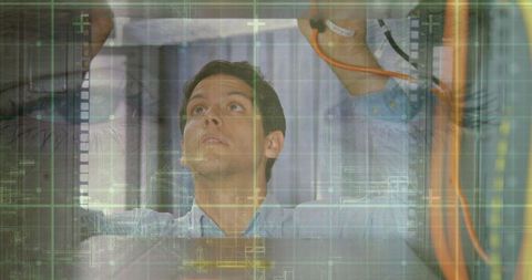 IT Engineer Managing Network Cables and Digital Interface Overlay - Download Free Stock Images Pikwizard.com