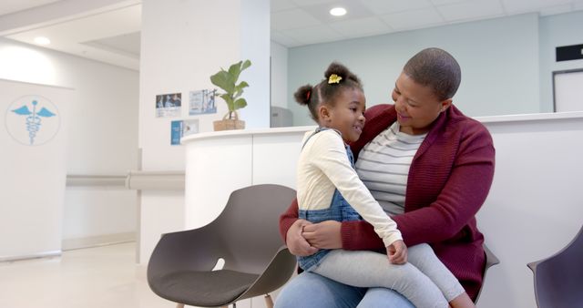 Mother Comforting Daughter in Hospital Waiting Room - Download Free Stock Images Pikwizard.com