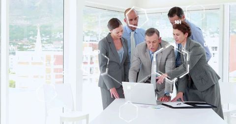 Diverse Business Team Analyzing Data with Hexagon Technology Interface