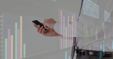 Executive Analyzing Financial Data on Smartphone in Modern Office