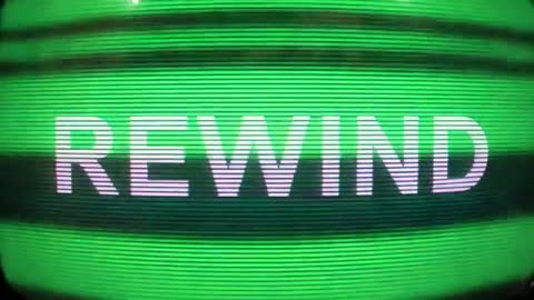 Flickering REWIND Text Shifting on Retro CRT Monitor with Green Scanline Glare, VHS Glitch
