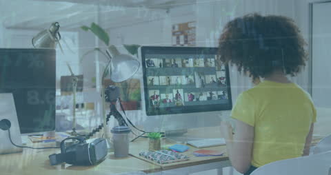 Businesswoman Analyzing Digital Data on Office Computer