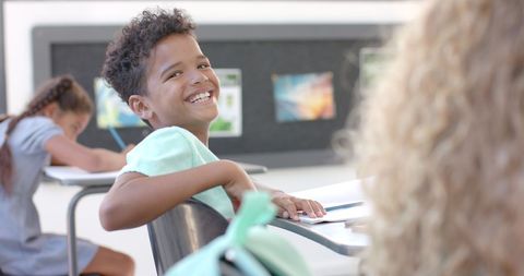 Smiling Student Enthusiastically Engaged in Classroom Learning - Download Free Stock Images Pikwizard.com