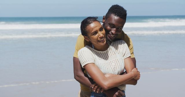 Happy Couple Hugging on the Beach - Download Free Stock Images Pikwizard.com