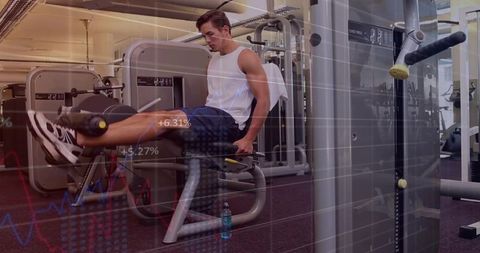Man Using Leg Extension Machine Focused on Quad Training in Gym
