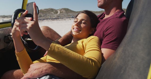 Couple Relaxing in Car at Beach Taking Selfie on Sunny Day - Download Free Stock Images Pikwizard.com