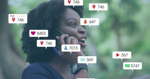 African American Woman Engaging with Social Media Notifications on Phone