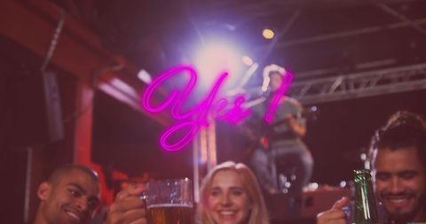 Friends Celebrating Night Out with Drinks at Bar