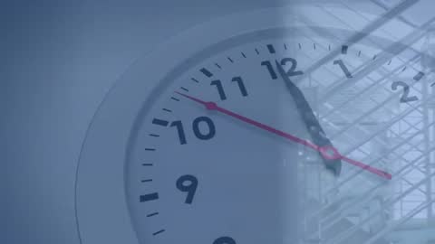 Architects Analyzing Atrium with Clock and Steel Structure Overlay