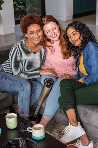 Diverse female friendship embracing connection and acceptance