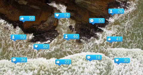 Aerial coastline showing social media engagement bubbles over waves and rocky tidepools for marketin