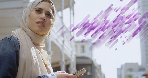 Biracial Businesswoman Using Smartphone with Abstract Design Overlay