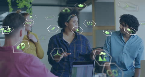 Team Analyzing Green Digital Data in Modern Office