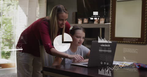 Mother and Daughter Collaborating with Digital Overlay on Laptop