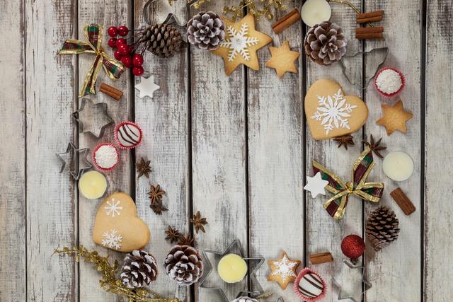 Christmas cookies with various types of decoration on a plank