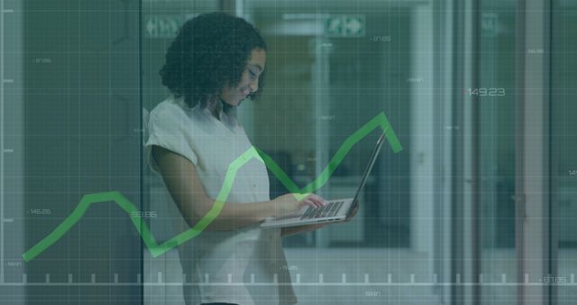 Young Professional Analyzing Business Data on Laptop with Growth Graph Overlay - Download Free Stock Images Pikwizard.com