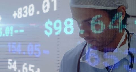 Male Surgeon Analyzing Data Against Stock Market Display