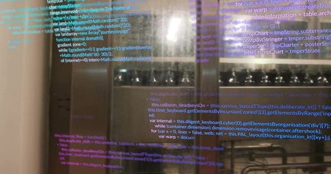 Programming Code Reflected on Glass in Modern Commercial Kitchen