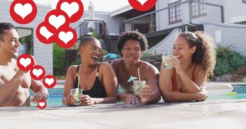 Four friends laughing poolside with refreshing drinks and social media heart overlays