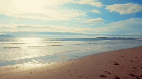 tranquil transparent seascape during sunset with cloudy sky - Download Free Stock Videos Pikwizard.com