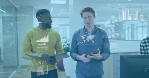 Diverse Business Colleagues Analyzing Digital Data and Graphs