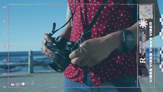 Person preparing to capture ocean views with camera, enjoying outdoor photography. Ideal for highlighting outdoor exploration, photography and videography interest, and creativity in capturing nature.