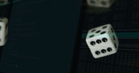 Tumbling dice against digital code screens explores cybersecurity concepts