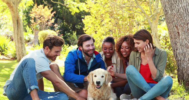 Group of Friends Enjoying Day at Park with Dog - Download Free Stock Images Pikwizard.com