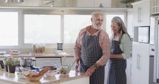 Happy Senior Couple Preparing Food in Modern Kitchen - Download Free Stock Images Pikwizard.com