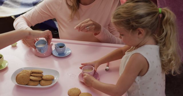 Mother and Daughters Enjoy Coffee and Milk Together - Download Free Stock Images Pikwizard.com