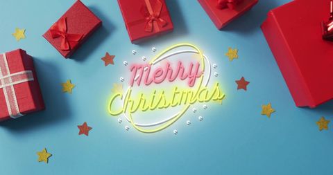 Festive Merry Christmas Neon Text with Gift Boxes and Stars - Download Free Stock Images Pikwizard.com