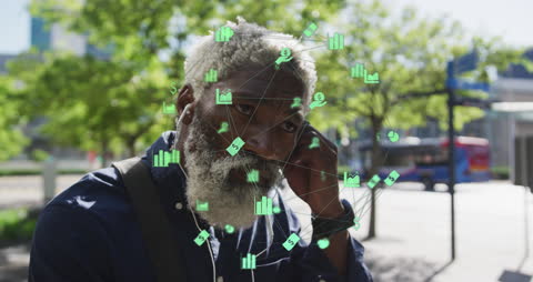 Senior Man Engaged with Digital Analytics and Connectivity