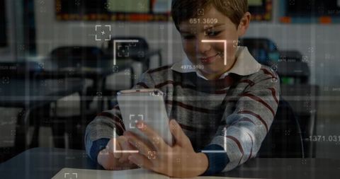 Smiling Boy Engaging with Smartphone in Modern Classroom Environment