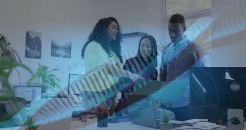 Dna strand overlay on diverse business team in office