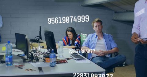 Team Analyzing Data at Office with Futuristic Interface