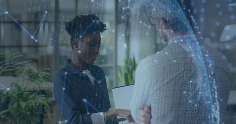 Diverse Colleagues in Office with Digital Data Overlay