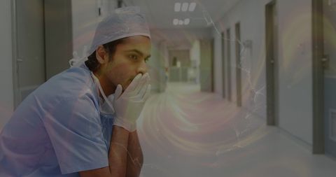 Contemplative male nurse highlighting mental health awareness