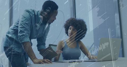 Innovative Business Team Discussing Data Insights in Modern Office