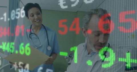 Healthcare Professionals Analyzing Finances with Digital Interface