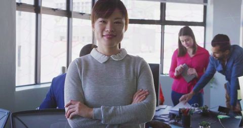 Diverse Team Collaborating in Bright Modern Office Setting