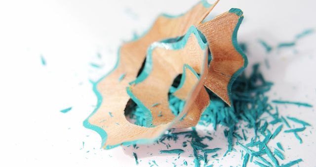 Close-up of pencil shaving with turquoise debris - Download Free Stock Images Pikwizard.com