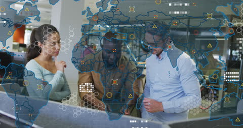 Diverse Team Analyzing Global Data with World Map Overlay