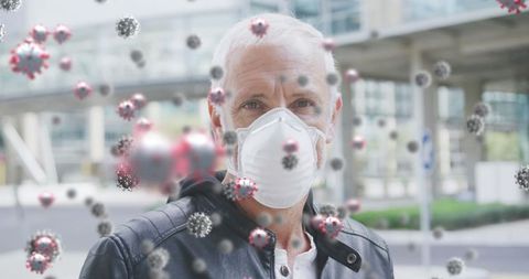 Man with mask amidst virtual covid-19 cells in urban area