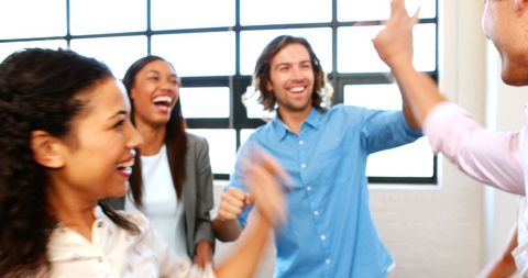 Business Team Celebrating with High Fives in Office - Download Free Stock Images Pikwizard.com