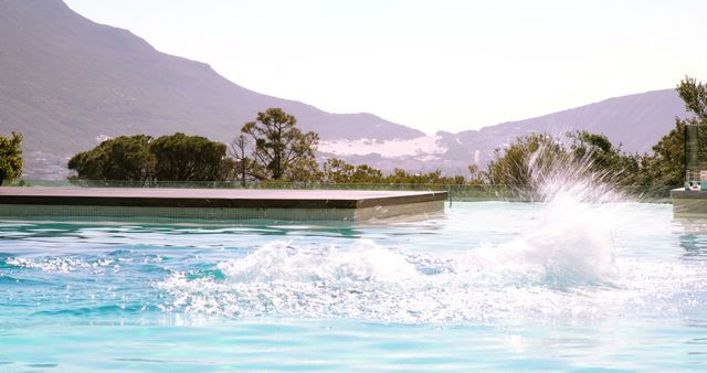 Refreshing Splash in Outdoor Mountain Pool - Download Free Stock Images Pikwizard.com