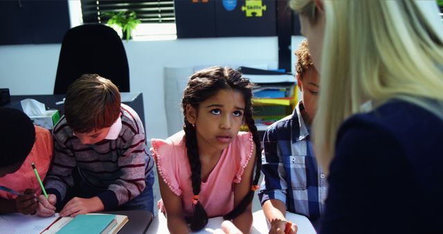 Diverse Students Learning with Teacher in Classroom, Focus on Engagement - Download Free Stock Images Pikwizard.com